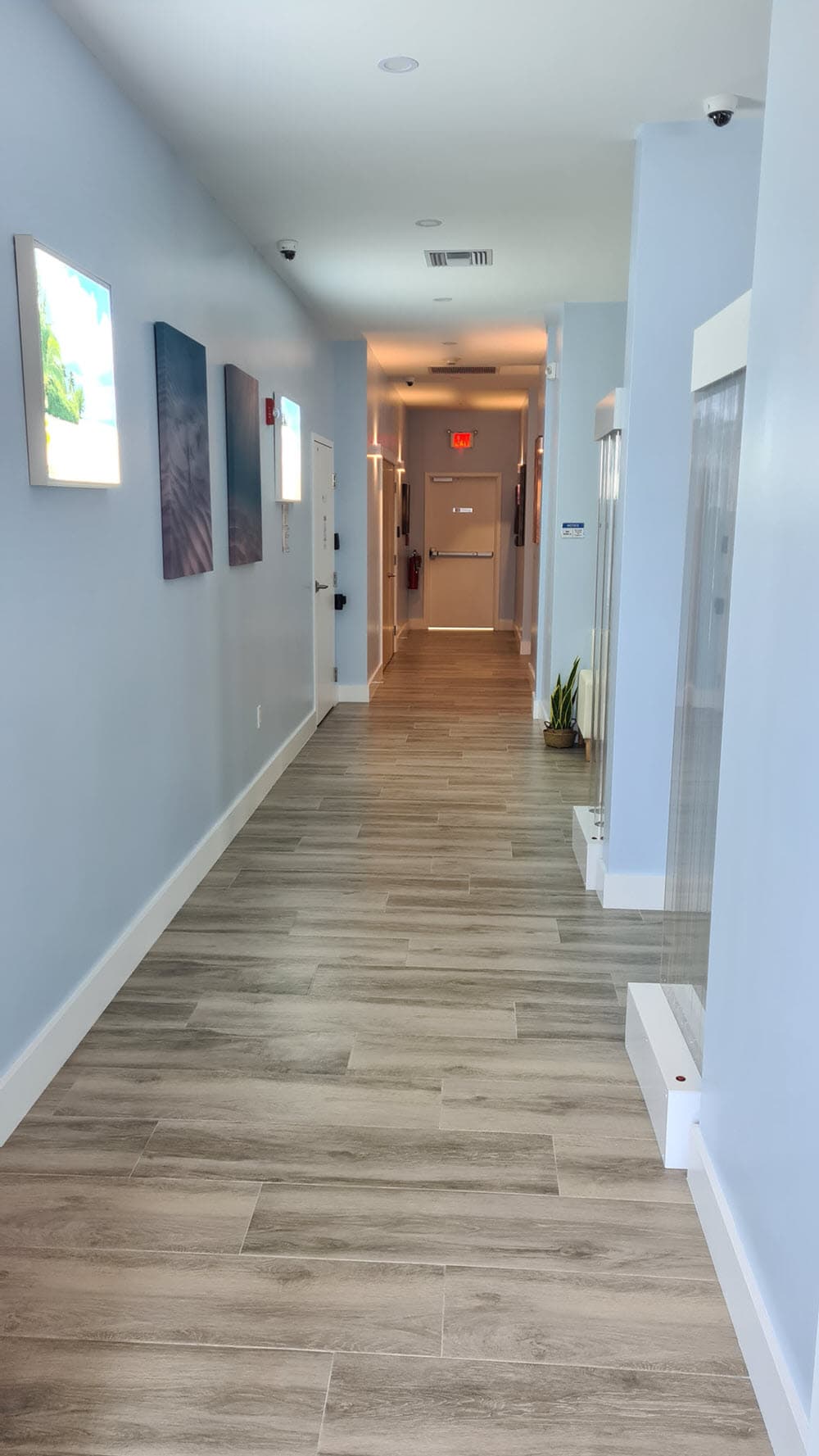 Clinic hallway with artwork at Cayman Medical