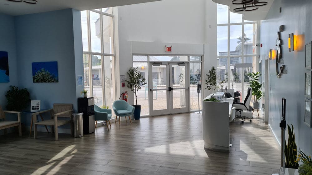 Art-lined corridor at Cayman Medical